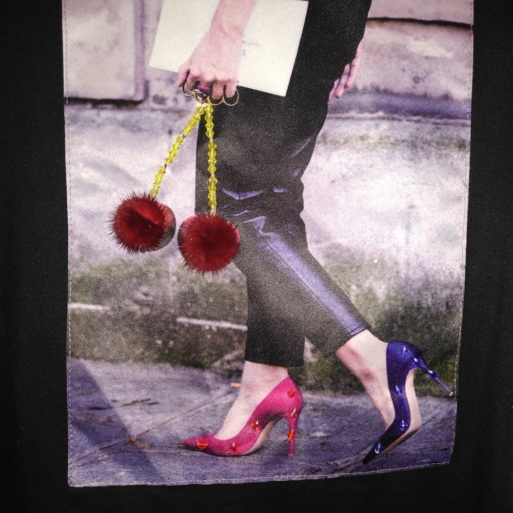 T-shirt with spikes and puffy pom poms